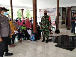 Sinergritas TNI Polri Dukung Vaksinasi di Desa Gunung