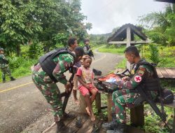 Satgas Yonif 126/KC Obati Anak Di Perbatasan Papua