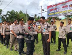Kapolres Bima AKBP Hariyanto SH, SIK, Pimpin Upacara HUT Satpam Ke-42 di Lapangan Mapolres Bima