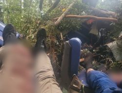 Pesawat Heli Bell 412 SP Reg P-3001 Mendarat Darurat di Desa Tamiai Kecamatan Batang Merangin Kabupaten Kerinci