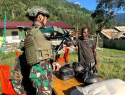 Terpancarnya Keceriaan Masyarakat Papua Dengan Ulah Prajurit Buaya Putih
