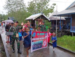 Satgas Yonif 125/SMB Ikuti Jalan Santai Dalam Rangka Hari Anak Nasional