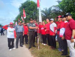 Meriahkan HUT Kemerdekaan RI ke 79 Forkopimcam Bersama Masyarakat Kibarkan Bendera Mewah Putih