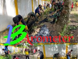 Satgas Pamtas Yonarmed 11 Kostrad Gelar Karya Bakti Pembersihan Jalan di Desa Aji Kuning