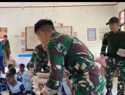 Pos Jagiro Satgas Yonif 642/Kps Bagikan Makan Gratis di Sekolahan
