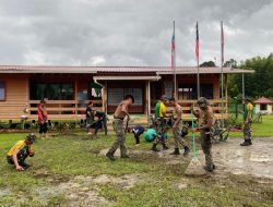 Pererat Hubungan Baik Antar Negara, Satgas Pamtas Yonarmed 11 Kostrad Gelar Karya Bakti di Sekolah Kebangsaan Saliku