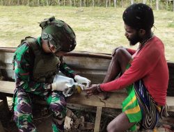 Respon Cepat, Satgas Yonif 323/Buaya Putih Kostrad Obati Luka Masyarakat Kampung Mayuberi
