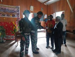 Solidaritas Satgas TNI Terwujud dalam Ibadah Bersama Warga, Dipandu Serda Jendry.