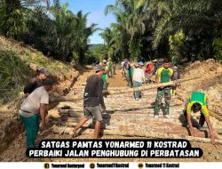 Satgas Pamtas Yonarmed 11 Kostrad Perbaiki Jalan Penghubung di Perbatasan