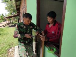 Progres Program TMMD Ke-124 Kodim 1802/Sorong Pasang Pintu dan Jendela