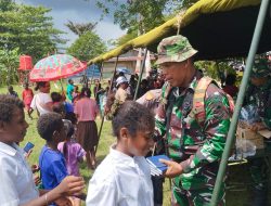 Satgas TMMD Ke-124 Kodim 1802/ Sorong, Laksanakan Pembagian Alkitab pada Anak-anak Sekolah Minggu