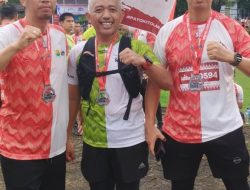 Personil Bid Humas Polda Sumsel bersama Kasubdit menjadi Peserta Lomba Lari Musi 5K
