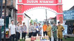 Kapolres Gresik Turun ke Lokasi Banjir dan Salurkan Bantuan Sembako di Benjeng