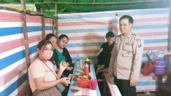 Polisi Sambangi Warga dan Jajanan Malam di Tengah Keramaian