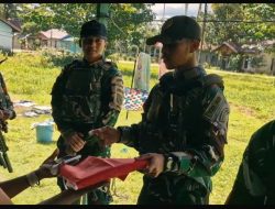 Sambut HUT RI ke-80, Satgas Yonif 763/SBA Bagikan Bendera Merah Putih di Wilayah Warga Binaan