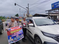 Satlantas Polres Banyuasin Pasang Bendera Merah Putih Pada Kendaraan dan Bentangkan Spanduk Polantas Menyapa