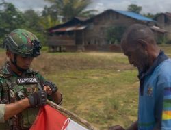 Pos Selal Yonif 751/VJS dan Warga Meriahkan HUT RI ke-80 dengan Pemasangan Umbul-umbul dan Merah Putih