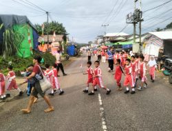 Polisi Jadi Sahabat Anak, Polsek Sengah Temila Amankan Gerak Jalan Santai Siswa SD