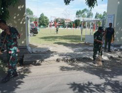 Jelang Penutupan TMMD Reguler Ke-125 Kodim 0735/Surakarta, Anggota Satgas Bersama Warga Bersihkan Lapangan