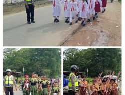 Polsek Mempawah Hulu Laksanakan Pengamanan Pertandingan Lomba Gerak Jalan