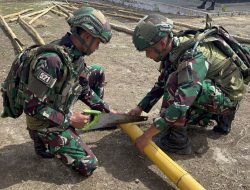 Karya Bhakti Satgas Yonif 521/DY Bersama Warga di Gereja Kobakma