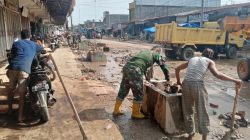 TNI–Polri dan Pemerintah Kecamatan Tanah Luas Gelar Baksos Pembersihan Jalan di Keude Blangjrun