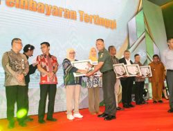 Kasdim 0418/Palembang Letkol Inf Dery Septiandi, S.T., M.M., M.Han. hadiri Pemberian Penghargaan Wajib Pajak Kota Palembang Tahun 2025