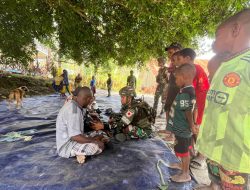 Pelayanan Kesehatan Gratis Satgas Yonif 521/DY Menyambut hari Natal di Distrik Kelila