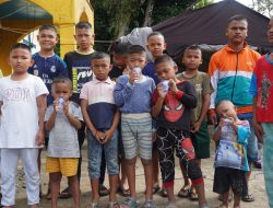 Kodim 0210/Tapanuli Utara Gelar Cukur Rambut Gratis untuk Anak Pengungsi Pascabencana