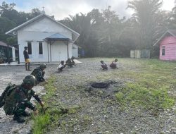 Binter TNI Bersih itu Indah Satgas Yonif 521/DY Gotong Royong Bersihkan Lingkungan Gereja di Kampung Muaranawa