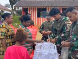 Satgas Yonif 763/SBA Berbagi Kebahagiaan di Wilayah Penugasan