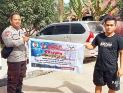 Dengan Menggunakan Banner, Personel Polsek Mempawah Hulu Ajak Warga Tidak Melakukan Pembakaran Hutan dan Lahan