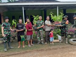 Peduli Lingkungan, Satgas TMMD ke-127 Bersama Warga Tanam Pohon di Bantaran Sungai Desa Wonosari