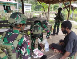 Satgas Yonif 763/SBA Berikan Pelayanan Kesehatan Gratis Untuk Masyarakat