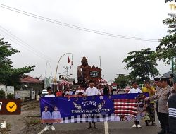 Wakili Kapolres Mesuji Kabag Ren Hadiri Pawai dan Festival Ogoh-Ogoh di Simpang Pematang Jelang Nyepi 1948 Saka
