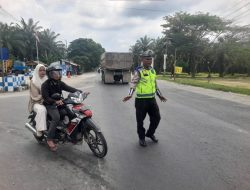 Sat Lantas Polres Batu Bara Gelar Patroli Siang di Jalinsum Simpang Pos Lantas Sei Bejangkar