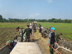 Cuaca Panas Bukan Halangan Bagi Satgas TMMD