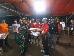 Babinsa Koramil 0818/11 Donomulyo Hadiri dan Amankan Partai Final Tarik Tambang Desa Mentaraman