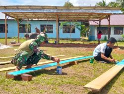 Satgas Yonif 123/Rajawali Bangun Garasi Gereja GPI Eci di Distrik Assue, Asgon