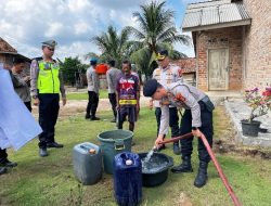 Polres Mesuji Salurkan Bantuan Air Bersih Untuk Warga Desa Labuhan Permai Dalam Rangka Memperingati Hari Bhayangkara Ke-80 Tahun 2026