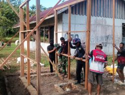 Wujudkan Sanitasi yang Layak, Personel Satgas TMMD KE-129 Bangun MCK dan Sumur di Wanam