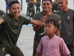 Prajurit Yonif TP 449/SH Larut Dalam Kecerian Lomba 17-an Bersama Warga