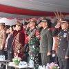 Satgas Pamtas RI-Malaysia Yonarmed 19/Bogani Ikuti Upacara Bendera HUT ke-81 Kemerdekaan RI di PLBN Entikong