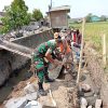 Perkuat Irigasi Pertanian, Babinsa Ketaon Bersama Warga Bangun Talud