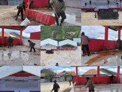 Marinir dan Masyarakat Bersatu dalam Karya Bakti Bersihkan Lapangan Karel Gobay