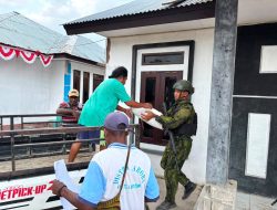 Jaga Kelancaran Penyaluran Bantuan, Pos Aroba Satgas Yonif 147/KGJ Kawal Distribusi Beras Pemerintah di Distrik Aroba