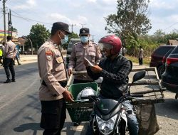 Kompi Siaga II Polres Mesuji Gelar KRYD dan Bagikan Masker, Jaga Kamtibmas dan Rasa Aman Pengguna Jalan Lintas Timur