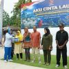Peringati HUT Ke-81 TNI AL, Prajurit TNI Polri dan Masyarakat Bersih-bersih Pantai Tanjung Kasuari