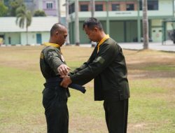 Kadertih PSM Jajaran Korem 143/HO Gelar Tradisi Penyematan Sabuk dan Kenaikan Tingkat Sabuk Hitam
