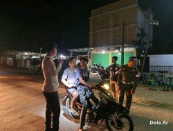 Personil Gabungan Polsek Tanjung Raya dan Sat Pol PP Mesuji Laksanakan Patroli dan KRYD di Simpang Empat Desa Brabasan